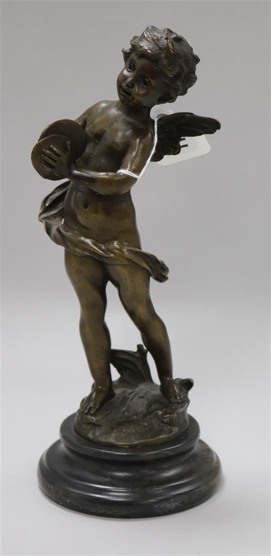 A bronze figure of a cherub H.29cm